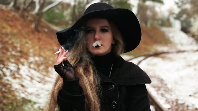 Young woman smoking a cigarette