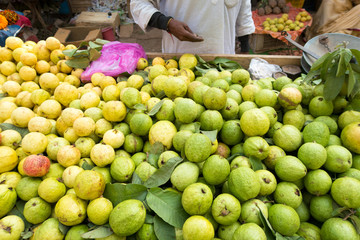 Ghat ganges Varanasi india selling fruit and vegetables on the street
