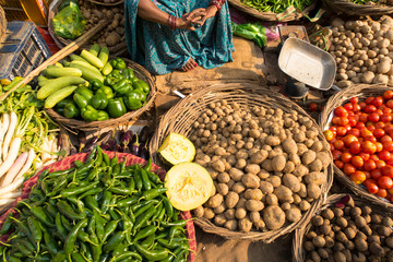 Ghat ganges Varanasi india selling fruit and vegetables on the street
