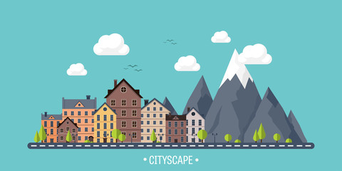 City in summer. Urban landscape with mountains. Town. Mountain peak,snow. House in village. Weather.