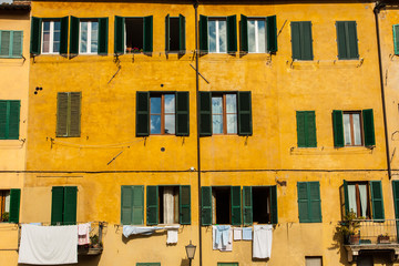 wall of old houses in Siena