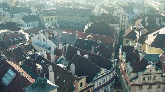 Sloped roofs and narrow streets of famous Old town in Prague, Czech Republic. 4K pan establishing shot