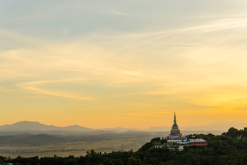 Tha Ton Temple set amid green mountains with sunset sky,Place for religious practices of Thailand