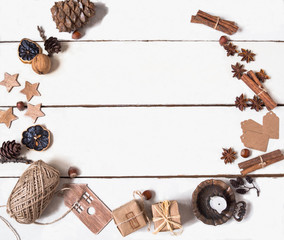 Various brown christmas items gathered in a circle  to write on white boards
