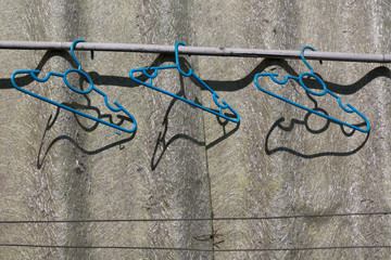 clothes hangers on the roof background