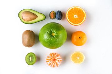Various tropical fruits on white background