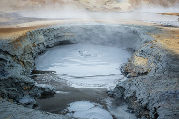 Boiling mudpot in Hverir (Hverarond) geothermal area, Iceland.