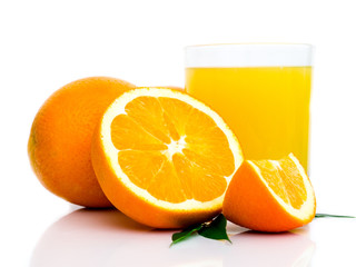 orange fruit and orange juice in glass isolated on white background