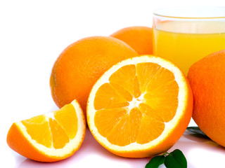 orange fruit and orange juice in glass isolated on white background