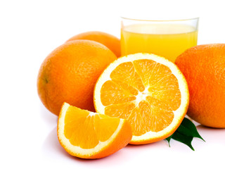 orange fruit and orange juice in glass isolated on white background