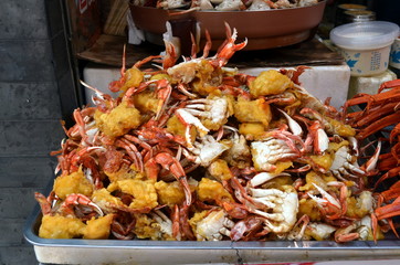 Cooked legs crab are on the shopping tray for sale in Wangfujiang street in China