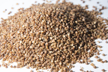 Buckwheat is scattered on the table.
