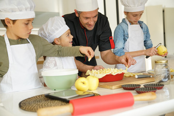 Pastry class with kids little chefs © goodluz