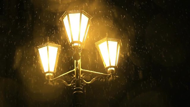 Night lantern and snowfall.