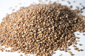 Buckwheat is scattered on the table.
