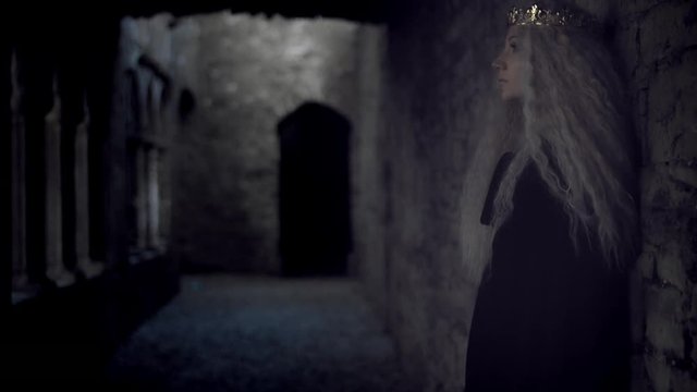 4k Medieval Shot of Game of Thrones Style Queen Posing Dramatic in Castle