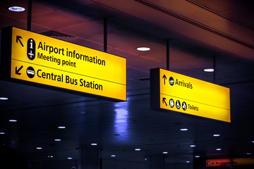 Airport sign boards at an airport with directions