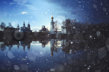 Fototapeta na wymiar Church on the river autumn landscape in Russia