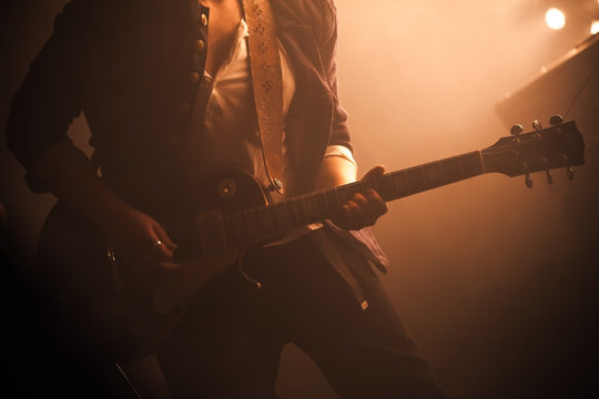Electric guitar player on a stage