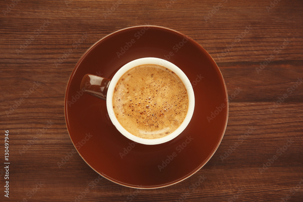 Sticker cup of coffee on wooden background