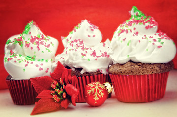 Colorful Christmas cupcakes with copy space