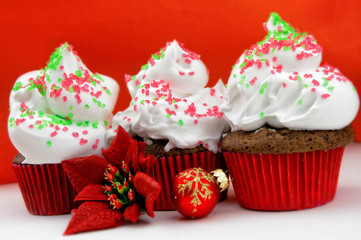 Colorful Christmas cupcakes with copy space