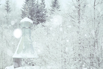 Naklejka na ściany i meble Old Orthodox Church in the winter landscape