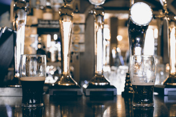 Chrome beer taps with highlights in the pub