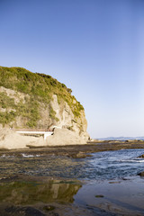 Fototapeta na wymiar View of Enoshima Island From the Observation Deck at Samuel cocking garden - Kamakura, Japan