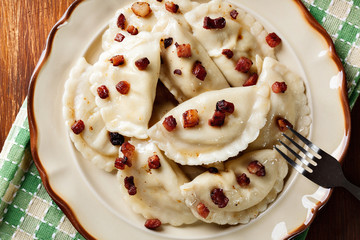 Dumplings with meat or cabbage and mushroom or cheese seasoned f
