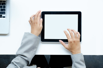 Businesswoman with Digital Tablet in Office