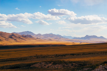 The magnificent view of colourful Tien Shan (Tian Shan) mountain  landscape in the east of Kyrgyzstan, on the way to Chinese Border of Xinjiang province. Central Asia