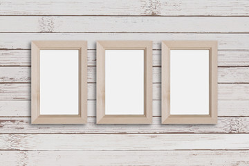 Three wooden frames on old painted panels wood wall. Rustic stytle decor mock up