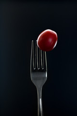 Aufgespieste Tomate