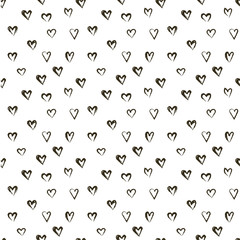 Vector pattern with heats, made of brush stroke. Black and white seamless background.
