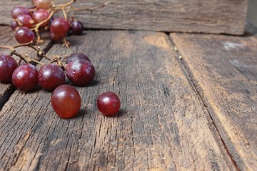 Grape red fresh Select focus with shallow depth of field on wooden table background
