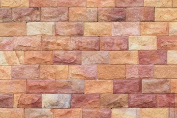 Sandstone brick wall texture background pattern and color