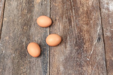  egg on wood background. Top view
