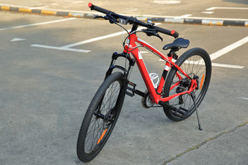 Fototapeta na wymiar closeup of mountain bike at parking lot