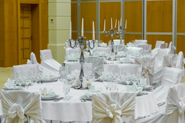 catering table set service with silverware, napkin and glass at restaurant before party