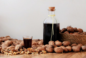 Walnut spirit. Homemade alcoholic drink made from walnut and rum.