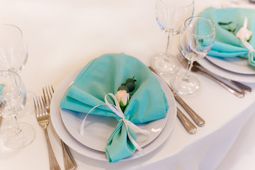 table setting in turquoise color
