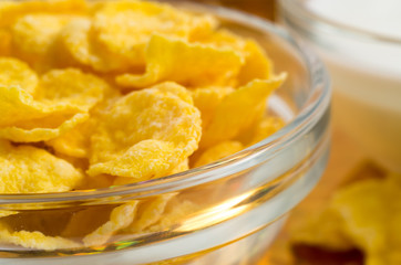 Blurred image of a glass cup with cornflakes