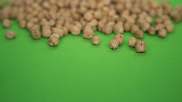scattered peas on a green background
