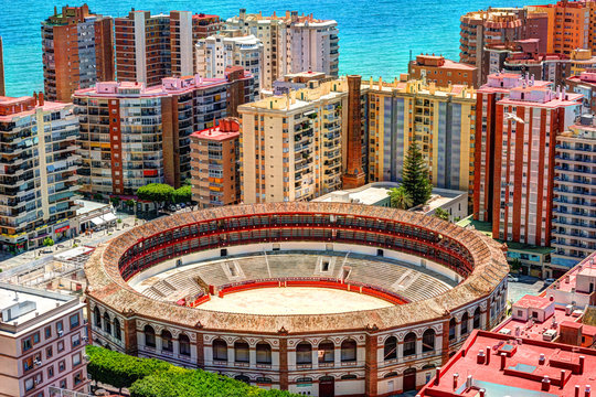 Day view of Malaga with Port and Placa de Torros from castle in sunny time. Andalusia, Spain