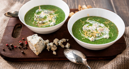 fresh and tasty green cream soup of spinach and broccoli