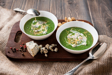 fresh and tasty green cream soup of spinach and broccoli