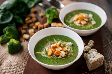 fresh and tasty green cream soup of spinach and broccoli