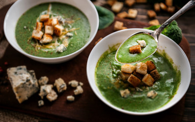 fresh and tasty green cream soup of spinach and broccoli