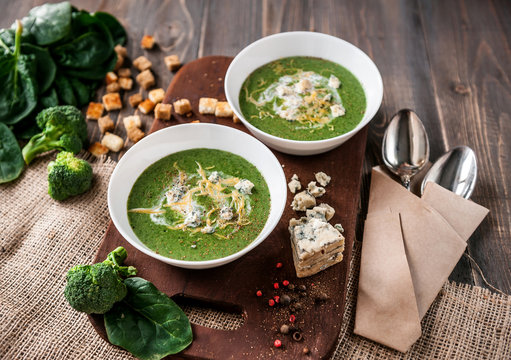 fresh and tasty green cream soup of spinach and broccoli